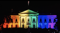 The White House illuminated in rainbow colors, 2015/Flickr via Wikipedia