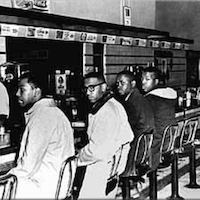 Four students sit in at Woolworth lunch counter in Greensboro NC, Feb. 1, 1960